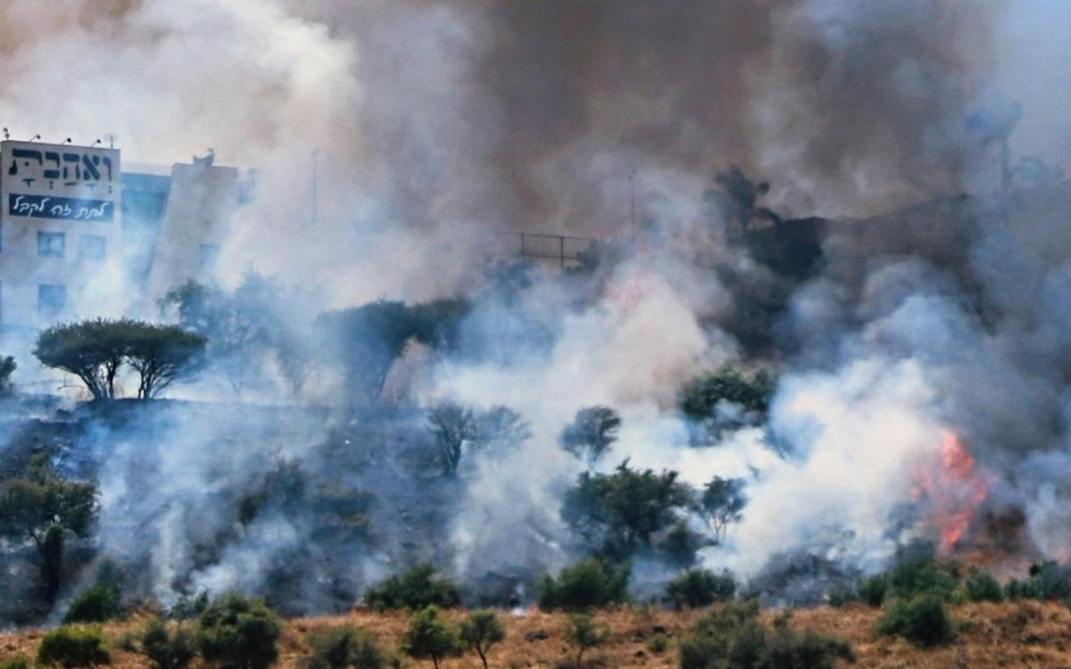 Two Sides of the Same Crisis: Climate, Security, and the Need for